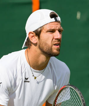 Tennis Player Jurgen Melzer Intensely Focused On The Court Wallpaper