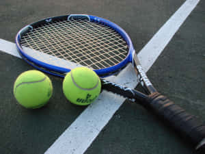 Tennis Racketand Ballson Court Wallpaper