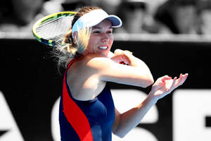 Tennis Star Caroline Wozniacki In Vibrant Multicolored Top Wallpaper