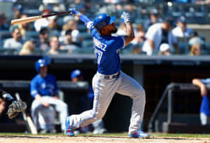 Teoscar Hernandez Swinging Baseball Action Wallpaper