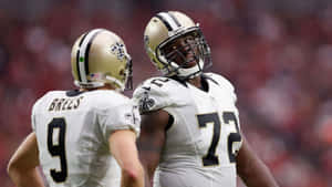 Terron Armstead With Drew Brees Wallpaper