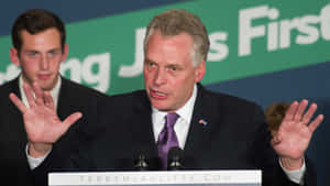 Terry Mcauliffe Delivering A Powerful Speech. Wallpaper