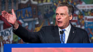 Terry Mcauliffe Delivering A Speech Wallpaper