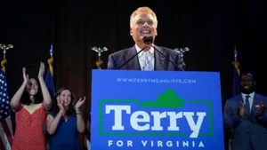Terry Mcauliffe Delivering Speech At A Rally. Wallpaper