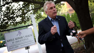 Terry Mcauliffe During A Visit At The Whole Woman's Health Clinic Wallpaper