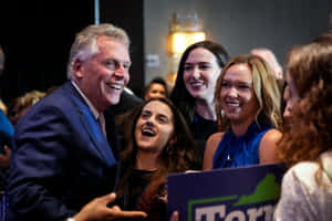 Terry Mcauliffe Enthusiastically Addressing His Supporters. Wallpaper