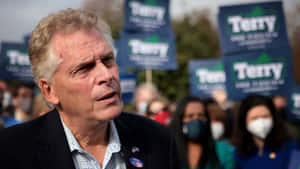 Terry Mcauliffe With Crowd Of Supporters Wallpaper