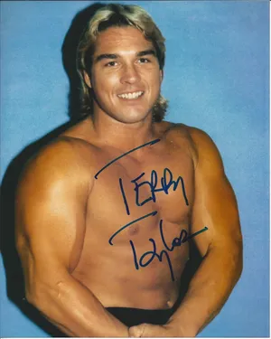 Terry Taylor Flexing His Arm Wallpaper