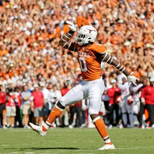 Texas Football Player Celebration Wallpaper