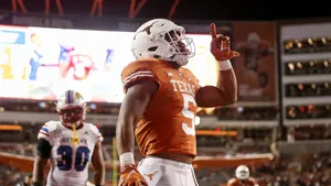 Texas Football Player Celebration Wallpaper