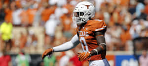 Texas Football Playerin Action Wallpaper