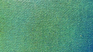 Textured Green Surface Background Wallpaper