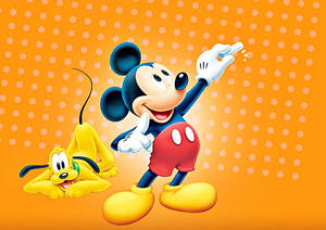 The Adorable And Loyal Pluto From Disney Showing His Playful Side Wallpaper