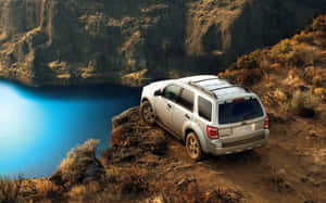 The All-new Ford Escape Suv In A Vibrant Outdoor Setting Wallpaper