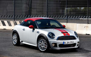 The Alluring Mini Roadster In Vibrant Red Wallpaper