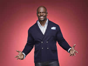 The Beloved Actor, Comedian And Former Football Player Terry Crews In His Signature Pose Wallpaper