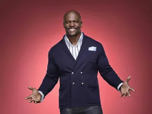 The Beloved Actor, Comedian And Former Football Player Terry Crews In His Signature Pose Wallpaper
