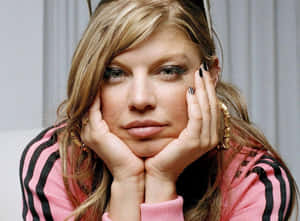 The Black Eyed Peas On Stage Putting On A Show Wallpaper