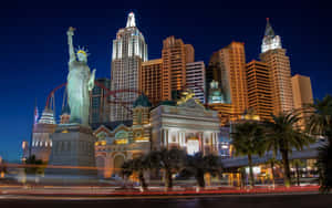 The Brilliant Lights Of Las Vegas Turn Night Into Day. Wallpaper