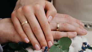 The Couple's Hands Ring Wallpaper