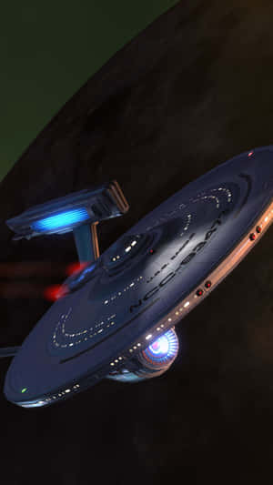 The Crew Of The Starship Enterprise Embarks On A Journey Of Exploration Wallpaper