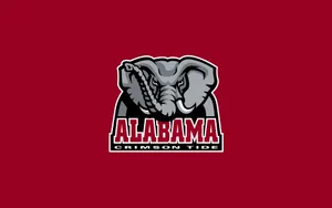 The Crimson Tide Proudly Stands Behind The Alabama Football Logo. Wallpaper