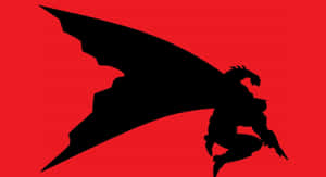 The Dark Knight Returns: Batman In Action Against The Sinister Forces Of Gotham City Wallpaper