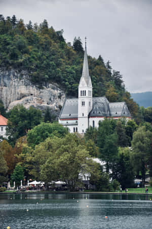 The Enchanting Parish Church Beside Lovely Lake Bled Wallpaper