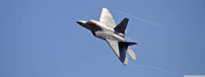 The F-22 Raptor, America's Premier Fighter Jet Wallpaper