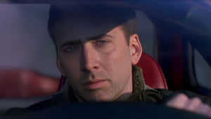 The Family Man Intense Driving Scene Wallpaper