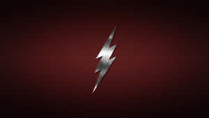 The_ Flash_ Symbol_on_ Textured_ Background.jpg Wallpaper