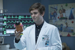 The Good Doctor Holding Potato Head Wallpaper