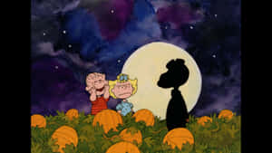 The Great Pumpkin Rising During A Haunting Night Wallpaper