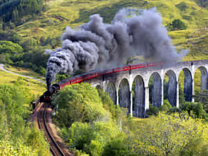 The Hogwarts Express, Transporting Lucky Witches And Wizards To The Magical World Of Hogwarts. Wallpaper