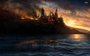 The Horizon Aflame As Hogwarts Burns Wallpaper