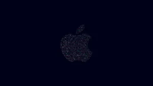 The Iconic Apple Logo Illuminated With Vibrant Gradients. Wallpaper