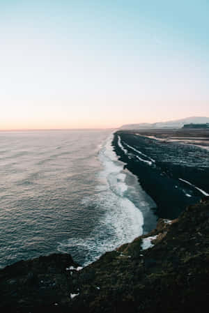 The Iconic Beauty Of Black Sand Beach Wallpaper