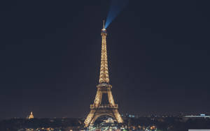 The Iconic Eiffel Tower, A Beloved Symbol Of Paris Wallpaper