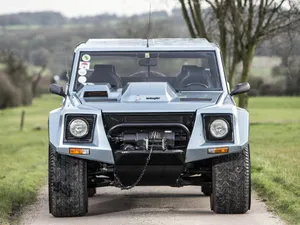 The Iconic Lamborghini Lm002 Off-road Luxury Suv In All Its Glory. Wallpaper