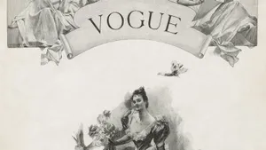 The Iconic Vogue Logo Against A Bright Backdrop Wallpaper