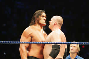 The Indian Wrestling Sensation, The Great Khali, Simultaneously Thrilling And Intimidating In A Face-off With Kane. Wallpaper