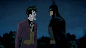 The Joker Confronts Batman In An Intense Scene From Batman: The Killing Joke Wallpaper