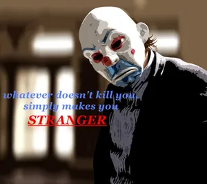 The Joker's Menacing Grin With Iconic Quotes Wallpaper