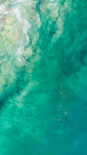 “the Latest And Greatest: The Turquoise Iphone” Wallpaper