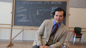 The Legendary John Leguizamo In An Artistic Portrait. Wallpaper