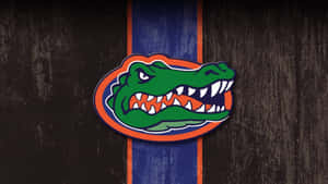 The Legendary Orange And Blue Florida Gators Logo Wallpaper