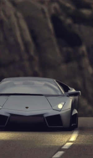 The Luxurious Black Lamborghini, A Symbol Of Status And Wealth Wallpaper