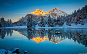 The Majestic Beauty Of An Alpine Lake Seen From Above Wallpaper