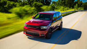 The Majestic Dodge Durango On Open Road Wallpaper