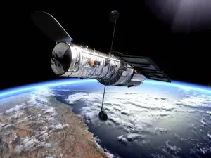 The Majestic Hubble Space Telescope In Orbit Wallpaper